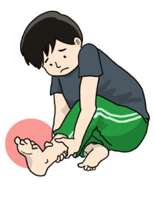 足首を捻挫して足首を押さえる学生のイラスト